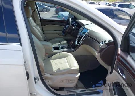 2015 Cadillac Srx Luxury Collection from USA, damaged, VIN 3GYFNBE39FS609626